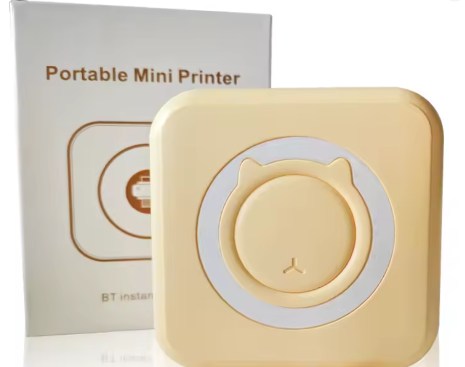 Portable mini Bluetooth photo printer in baby yellow, printing a photo wirelessly from a smartphone